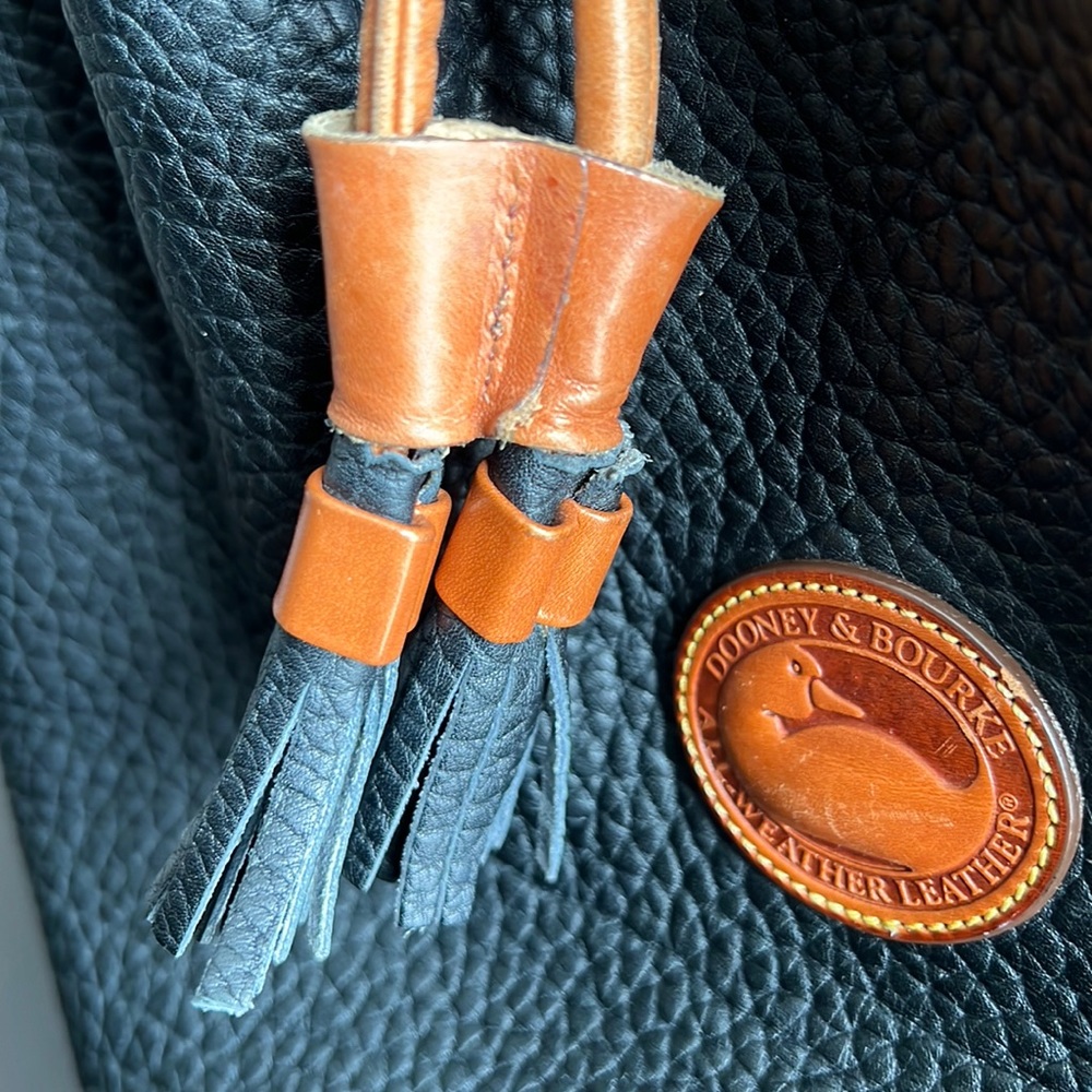 Vintage Dooney and Bourke Pebbled Leather Bucket Bag with brass accents - Picture 13 of 16